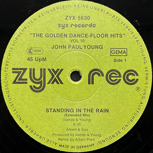 JOHN PAUL YOUNG // STANDING IN THE RAIN (EXTENDED MIX) (8:05) / (EXTENDED-MIX BACKING TRACK) (8:00) / LOVE IS IN THE AIR (3:31)