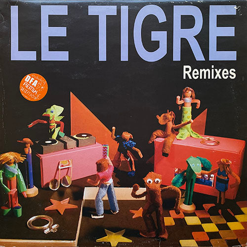 LE TIGRE // REMIXES (EP) inc. DECEPTACON (DFA REMIX) / DYKE MARCH 2001 / MUCH FINER / TRES BIEN / ON GUARD / MEDIOCRITY RULES