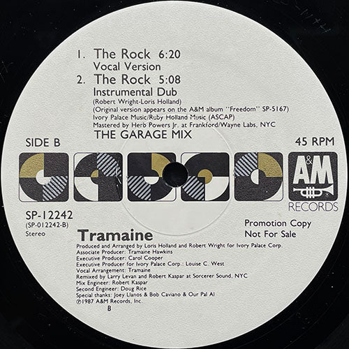 TRAMAINE // THE ROCK (VOCAL VERSION) (7:30) / (A CAPPELLA) (5:42) / (THE GARAGE MIX - VOCAL VERSION) (6:20) / (INSTRUMENTAL DUB) (5:08)