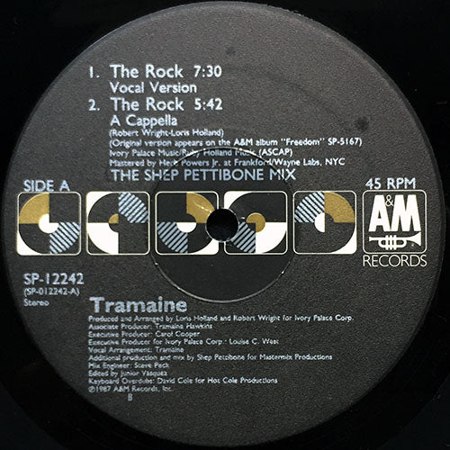 TRAMAINE // THE ROCK (VOCAL VERSION) (7:30) / (A CAPPELLA) (5:42) / (THE GARAGE MIX - VOCAL VERSION) (6:20) / (INSTRUMENTAL DUB) (5:08)