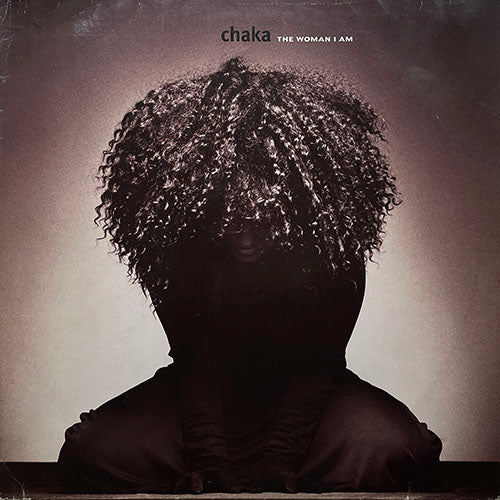 CHAKA KHAN // THE WOMAN I AM (LP) inc. EVERYTHING CHANGES / GIVE ME ALL / TELEPHONE / KEEP GIVIN' ME LOVIN' / FACTS OF LOVE / LOVE YOU ALL MY LIFETIME / I WANT / YOU CAN MAKE THE STORY RIGHT / BE MY EYES / THIS TIME / DON'T LOOK AT ME THAT WAY