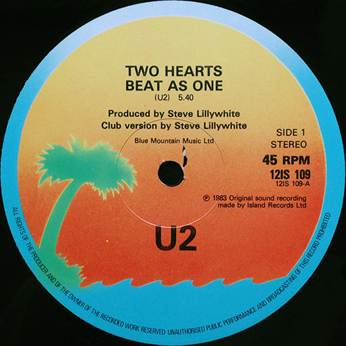 U2 // TWO HEARTS BEAT AS ONE (5:40/4:23) / NEW YEAR'S DAY (SPECIAL US REMIX) (4:30)